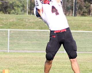 Nikos Frazier | The Vindicator..Canfield's Paul Breinz(4) jumps in the end zone as the ball narrowly misses his grasp in the second quarter at Rayen Stadium in Youngstown on Saturday, Oct. 15, 2016 as the Canfield Cardinals take on the East Panthers.