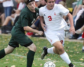 William D. Lewis The Vindicator Ursulines Cody Rackoff(2) and  Mooney's Paul Graziano?(3) during 10-18-2016 action at Simon.