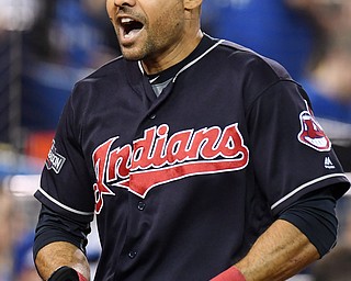 Cleveland Indians' Coco Crisp celebrates after hitting a solo home run against the Toronto Blue Jays during fourth inning in Game 5 of baseball's American League Championship Series in Toronto, Wednesday, Oct. 19, 2016. (Frank Gunn/The Canadian Press via AP)