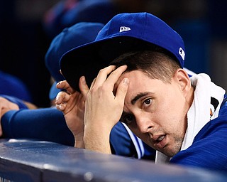 Toronto Blue Jays' Aaron Sanchez watches during the ninth inning of Game 5 against the Cleveland Indians in the baseball American League Championship Series, in Toronto on Wednesday, Oct. 19, 2016. (Nathan Denette/The Canadian Press via AP)