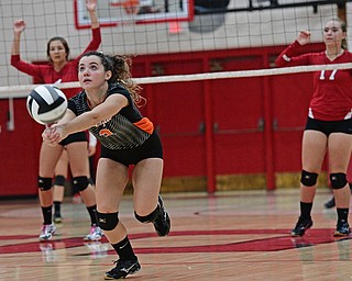 SALEM, OHIO - OCTOBER 19, 2016: Kaelen Yemma #2 of Springfield bumps the ball to keep it alive during their tournament game Wednesday night at Salem High School. Springfield won in three sets. DAVID DERMER | THE VINDICATOR