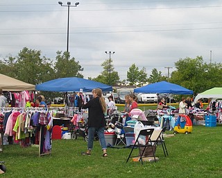 Neighbors | Alexis Bartolomucci.Families set up tents all around Boardman Park on Sept. 24 during the Baby Bargain Boutique fall sale.