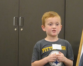 Neighbors | Alexis Bartolomucci.One of the children at the Boardman library annual talent show told jokes to the audience as his talent on Sept. 21.