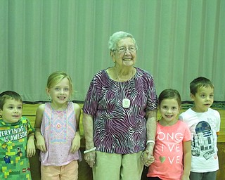 Neighbors | Alexis Bartolomucci.Some of the first-grade students stood with Kitty on Sept. 21 to celebrate her 90th birthday. Picture, from left, are Zech Murphy, Madison Medvec, Kitty, Alexis Flood and Cody Collins.