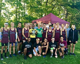 Neighbors | Submitted.The Spartan boys cross country team posed with their first place award after winning the Mahoning County Championship Meet.