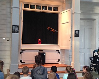 Neighbors | Alexis Bartolomucci.Children at the Poland library on Sept. 27 watched the second play, "Henny Penny," during the Positively Preposterous Puppet Show.