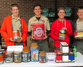 Neighbors | Submitted.Boy Scouts of Canfield Troop 25 Jacob Kuszaj, Hunter Amendolea, Thomas McNally and Steven Deak.display the popcorn products the troop is selling this fall to help fund their camping and other unit programs for the upcoming year.