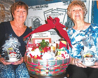 SPECIAL TO THE VINDICATOR
Austintown Historical Society will host its 28th Holiday Tea on Nov. 13 at the Strock Stone House, 7171 Mahoning Ave. Seatings will be at noon, 2 and 4 p.m. The public is invited but reservations are required by Nov. 7. The event will feature a basket raffle; tickets are one for $1, five for $3 and 15 for $5. Winners do not need to be present. Cost of tea is $15 for adults and $7 for children under 12. The menu includes coffee and a variety of teas, finger sandwiches, pastries, scones and more. The tea will be served in bone china cups and saucers and dessert plates and will complement lace tablecloths. Free tours of Strock House will be conducted after each seating. Chairmen are Marge Goldner, left, and Rae Jeanne Mollica. Joyce Pogany, right, is general chairman. All proceeds will benefit the historical society. For questions or reservations call Pogany at 330-792-1129.