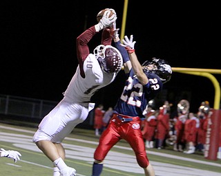 Boardman's Travis Koontz catches a pass at the one yard line over Austintown's J.C. Mikovich (22) during the second quarter of Friday nights matchup at Fitch High School.   Dustin Livesay  |  The Vindicator  10/21/16  Austintown.