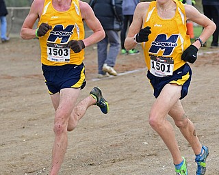 BAZETTA, OHIO - OCTOBER 22, 2016: CJ Seitz and Carson Fortune of McDonald sprint to the finish line of the boy's Division 3 district cross country meet at the Trumbull Country Fairgrounds Saturday afternoon. DAVID DERMER | THE VINDICATOR
