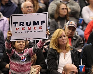 Cleveland, Ohio | Oct. 23, 2016: ..Ciara Schoeffel, 5, of Parma, holds a "Trump Pence" sign before Republican presidential nominee Donald Trump spoke to supporters at the I-X Center on Saturday, Oct. 23, 2016 in Cleveland, Ohio...Nikos Frazier | The Vindicator.