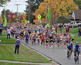 YOUNGSTOWN, OHIO - OCTOBER 23, 2016: Runners take off from the starting line on Kirk Road at the start of the Peace Race, Sunday morning. DAVID DERMER | THE VINDICATOR