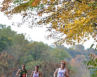 YOUNGSTOWN, OHIO - OCTOBER 23, 2016: Luke Hickman of Willoughby Hills runs on West Glacier Drive inside Mill Creek Park during the Peace Race, Sunday morning. DAVID DERMER | THE VINDICATOR