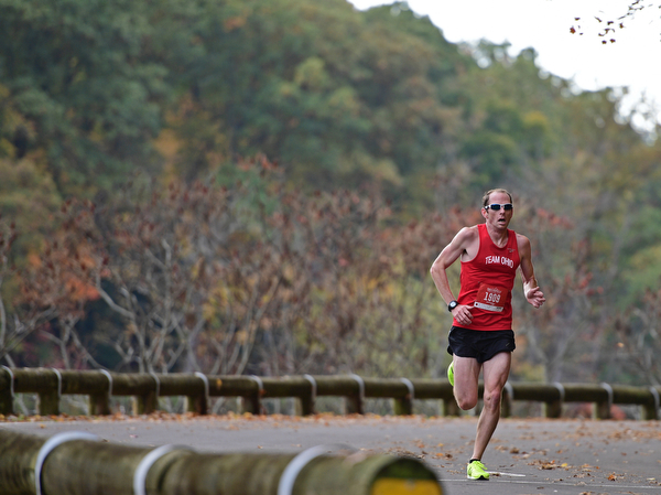 YOUNGSTOWN, OHIO - OCTOBER 23, 2016: Scott Mate runs on West Glacier Drive inside Mill Creek Park during the Peace Race, Sunday morning. DAVID DERMER | THE VINDICATOR