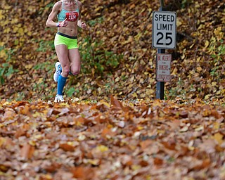 YOUNGSTOWN, OHIO - OCTOBER 23, 2016: Gabrielle Kennelley runs on West Glacier Drive inside Mill Creek Park during the Peace Race, Sunday morning. DAVID DERMER | THE VINDICATOR