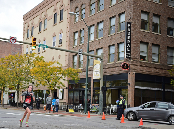 YOUNGSTOWN, OHIO - OCTOBER 23, 2016: Julia Gorby sprints to the finish line on West Federal Street during the Peace Race, Sunday morning. DAVID DERMER | THE VINDICATOR
