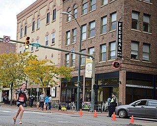 YOUNGSTOWN, OHIO - OCTOBER 23, 2016: Julia Gorby sprints to the finish line on West Federal Street during the Peace Race, Sunday morning. DAVID DERMER | THE VINDICATOR