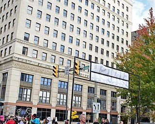 YOUNGSTOWN, OHIO - OCTOBER 23, 2016: Michael Rosteck of Canfield crosses the finish line on West Federal Street during the Peace Race, Sunday morning. DAVID DERMER | THE VINDICATOR