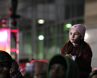Nikos Frazier | The Vindicator..Alyssa Popovich, 8, of Madison, Ohio, watch the Indians take on the Cubs between the Quicken Loans Arena and Progressive Field as the on Tuesday, Oct. 25, 2016.