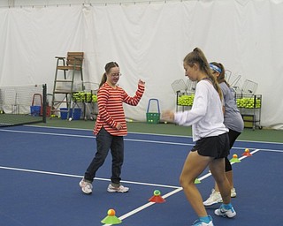Neighbors | Alexis Bartolomucci.The athletes and buddies worked together to practice their physical fitness on Sept. 24 at the Boardman Tennis Center before they started playing tennis.