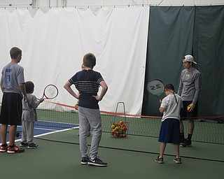 Neighbors | Alexis Bartolomucci.The buddies and athletes practice their tennis skills on Sept. 24 at the Boardman Tennis Center during the Buddy Up Tennis program.