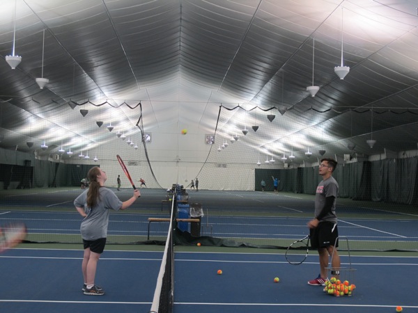 Neighbors | Alexis Bartolomucci.A Youngstown State tennis buddy played with one of the athletes of the Buddy Up Tennis program on Sept. 24 at the Boardman Tennis Center.