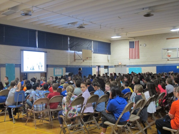 Neighbors | Alexis Bartolomucci.Students filled the cafeteria on Oct. 5 at Mckinley Elementary to listen to author, Nora Raleigh Baskin, talk about her newest book, "nine, ten: A September 11 Story."
