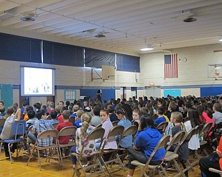 Neighbors | Alexis Bartolomucci.Students filled the cafeteria on Oct. 5 at Mckinley Elementary to listen to author, Nora Raleigh Baskin, talk about her newest book, "nine, ten: A September 11 Story."