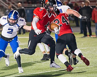 MICHAEL G TAYLOR | THE VINDICATOR- 10-28-16- 2nd qtr, Canfield's #4 Paul Breinz takes the ball from the 7 yard line of Poland into the endzone for the TD. Poland Bulldogs vs Canfield Cardinals at Bob Dove Field in Canfield, OH.