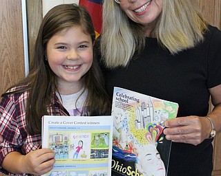 Neighbors | Abby Slanker.Ava Arundel (left) was named a winner in the Ohio Schools magazine’s annual Create a Cover Contest, with the help of Hilltop Elementary School physical education teacher Linda Magyar (right) who sent in Arundel’s drawing to the contest.