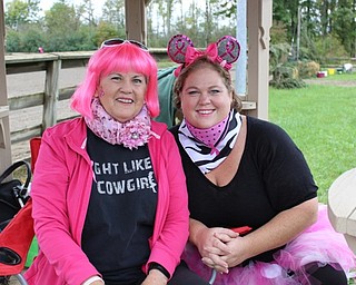 Neighbors | Abby Slanker.Sallie Sullivan (left) a breast cancer survivor, and her daughter, Megan Hruska, were decked out in pink in support of the third annual Survivor Run Hruska organized to honor her mother and other breast cancer survivors and to help spread awareness of early breast cancer detection on Oct. 1.