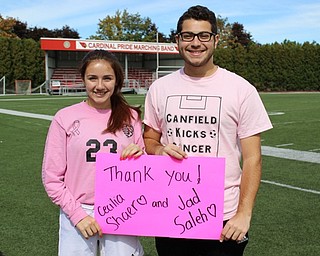 Neighbors | Abby Slanker.Canfield High School National Honor Society seniors and varsity soccer players Jad Saleh and Cece Shaer raised breast cancer awareness for their National Honor Society service projects during a Pink Out at the girls junior varsity and varsity soccer games against Hickory, and the boys junior varsity and varsity soccer games against Warren G. Harding on Oct. 8.