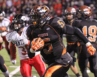 William D. Lewis The Vindicator   Howland's Tyriq Ellis(5) scampers for yardage  during Oct 28, 2016 action in warren.