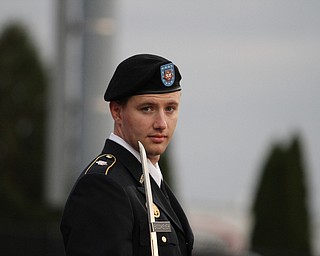 Nikos Frazier | The Vindicator..A member of the YSU ROTC holds a saber before escorting out the members of the 2016 homecoming court at the 2016 Youngstown State University Homecoming game against Indiana State at Stambaugh Stadium on Saturday, Oct. 29, 2016.