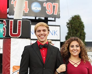 Nikos Frazier | The Vindicator..Jonathon Burns and Roselynn Betras, members of the 2016 homecoming court, pose for a photo at the 2016 Youngstown State University Homecoming game against Indiana State at Stambaugh Stadium on Saturday, Oct. 29, 2016.