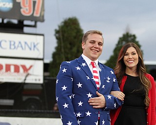 Nikos Frazier | The Vindicator..Todd Zickefoose and Emily Metzgar, members of the 2016 homecoming court, pose for a photo at the 2016 Youngstown State University Homecoming game against Indiana State at Stambaugh Stadium on Saturday, Oct. 29, 2016.