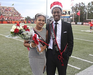 Nikos Frazier | The Vindicator..Kyle Moore and Rachel Davis pose for photos after being crowned king and queen at the 2016 Youngstown State University Homecoming game against Indiana State at Stambaugh Stadium on Saturday, Oct. 29, 2016.