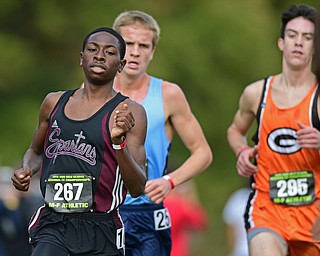 BOARDMAN, OHIO - OCTOBER 29, 2016: Chris Butler of Boardman runs in front of Noah Murray of Louisville and Stewart Schmidt of Green during the Division 1 Northeast Ohio Regional Cross Country race at Boardman High School. DAVID DERMER | THE VINDICATOR