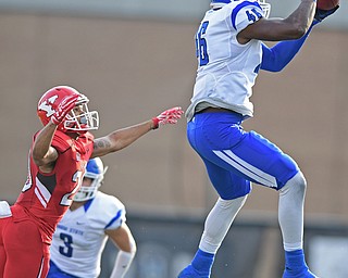 YOUNGSTOWN, OHIO - OCTOBER 29, 2016: Jonas Griffith #46 of Indiana State intercepts a pass intended for Jody Webb #20 of YSU during the first half of their game Saturday afternoon at Stambaugh Stadium. YSU 13-10. DAVID DERMER | THE VINDICATOR