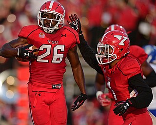 YOUNGSTOWN, OHIO - OCTOBER 29, 2016: Jameel Smith #26 of YSU is con graduated by teammate Eric Thompson #1 after a interception in the end zone during the first half of their game Saturday afternoon at Stambaugh Stadium. YSU 13-10. DAVID DERMER | THE VINDICATOR