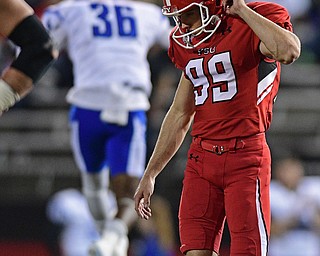 YOUNGSTOWN, OHIO - OCTOBER 29, 2016: Kicker Zak Kennedy #99 of YSU shows his frustration after missing a field goal during the second half of their game Saturday afternoon at Stambaugh Stadium. YSU 13-10. DAVID DERMER | THE VINDICATOR..Kevin Scott #36 of Indiana State pictured.