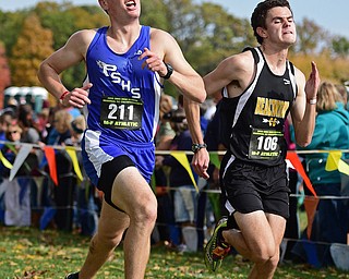 BOARDMAN, OHIO - OCTOBER 29, 2016: Andrew Comstock of Poland and Jack Spero of Beachwood sprint to the finish line during the Division 2 Northeast Ohio Regional Cross Country race at Boardman High School. DAVID DERMER | THE VINDICATOR