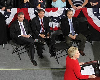 Kent, Ohio: Monday, Oct. 31, 2016..Rep. Tim Ryan(D-Ohio), Rep. John Boccieri(D-Ohio) and former Missile Defense officer listen to Democratic presidential nominee, Hillary Clinton speaks at the Kent State University Recreation & Wellness Center in Kent, Ohio. (Nikos Frazier | The Vindicator)
