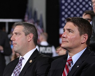 Kent, Ohio: Monday, Oct. 31, 2016..Rep. Tim Ryan(D-Ohio) and Rep. John Boccieri(D-Ohio) listen to Democratic presidential nominee, Hillary Clinton speaks at the Kent State University Recreation & Wellness Center in Kent, Ohio. (Nikos Frazier | The Vindicator)
