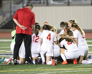 Solon, Ohio: Tuesday, Nov. 1, 2016..Cardinal Mooney players say a prayer before taking on Gilmour Academy at the Division III girls soccer regional semifinal at Stewart Field in Solon, Ohio on Tuesday, Nov. 1, 2016...(Nikos Frazier | The Vindicator