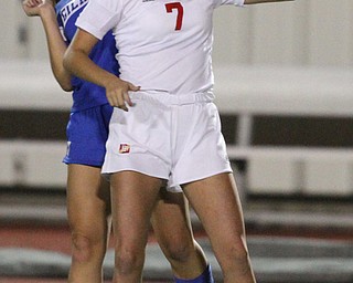 Solon, Ohio: Tuesday, Nov. 1, 2016..Mooney's Alexis Saunders(7) and Golmour's Allie Mullee(17) jump in the air to head the ball in the first half as Cardinal Mooney High School takes on Gilmour Academy at the Division III girls soccer regional semifinal at Stewart Field in Solon, Ohio on Tuesday, Nov. 1, 2016...(Nikos Frazier | The Vindicator