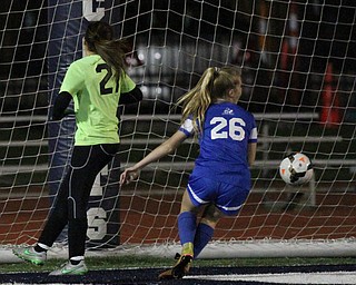 Solon, Ohio: Tuesday, Nov. 1, 2016..Gilmour's Allie Breen(26) scores a goal around Mooney goalie, Skyler Huda(21) in the second half as Cardinal Mooney High School takes on Gilmour Academy at the Division III girls soccer regional semifinal at Stewart Field in Solon, Ohio on Tuesday, Nov. 1, 2016...(Nikos Frazier | The Vindicator