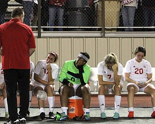 Solon, Ohio: Tuesday, Nov. 1, 2016..Mooney Head Coach, Frank Sikich talks with his players after Cardinal Mooney High School fell to Gilmour Academy, 7-1, at the Division III girls soccer regional semifinal at Stewart Field in Solon, Ohio on Tuesday, Nov. 1, 2016...(bench from right) Nicole Rotunnoi(20) Alexis Saunders(7), Trinity Adams(0), Lizzie Philibin(17)..(Nikos Frazier | The Vindicator