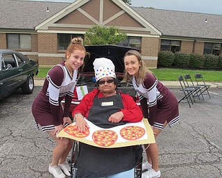 Neighbors | Alexis Bartolomucci.Two eighth-grade Boardman cheerleaders walked around with one of the Beeghly Oaks residents on .Oct. 1 during the first annual car show. Pictured, from left, are Kara Elisen, Audrey and Tara Pasvanis.
