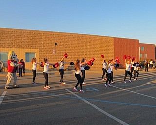 Neighbors | Alexis Bartolomucci.The Austintown Fitch High School dance line performed a dance with Scrappy from the Mahoning Valley Scrappers during the pep rally on Oct. 6.